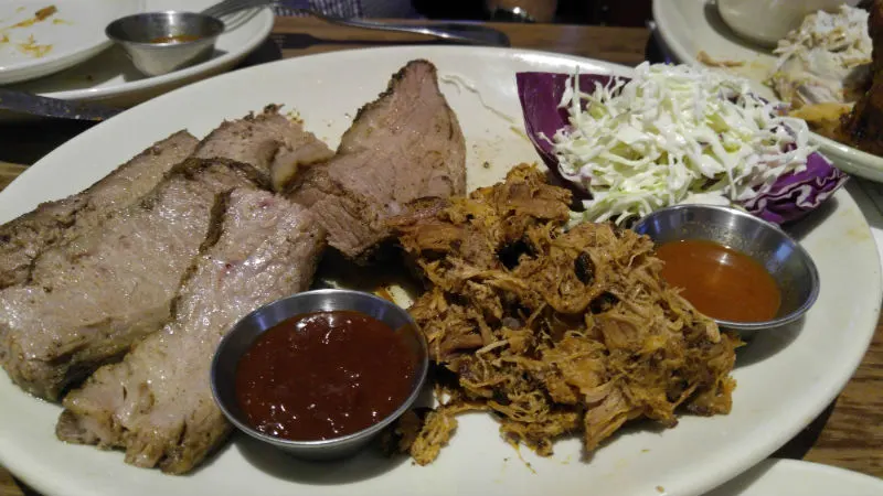 Brisket and pulled pork. Cherry chipotle sauce on left and Carolina sauce on right